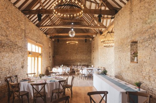 barn wedding reception ready for wedding guests